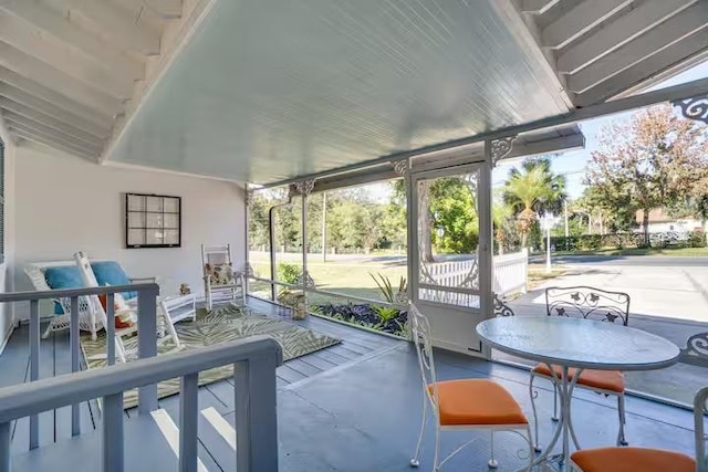 sunroom with a healthy amount of sunlight