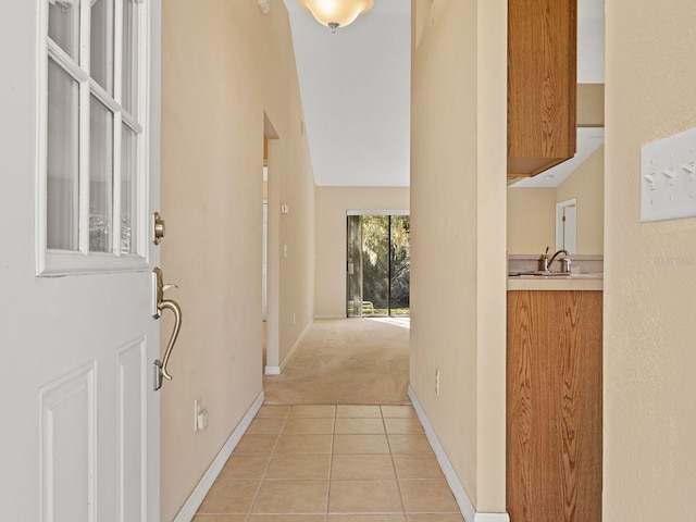 interior space featuring light colored carpet