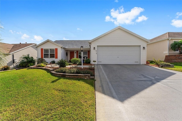 ranch-style house featuring a front yard and a garage