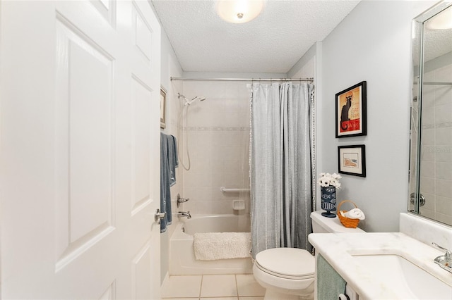 full bathroom featuring tile patterned floors, vanity, a textured ceiling, shower / bathtub combination with curtain, and toilet