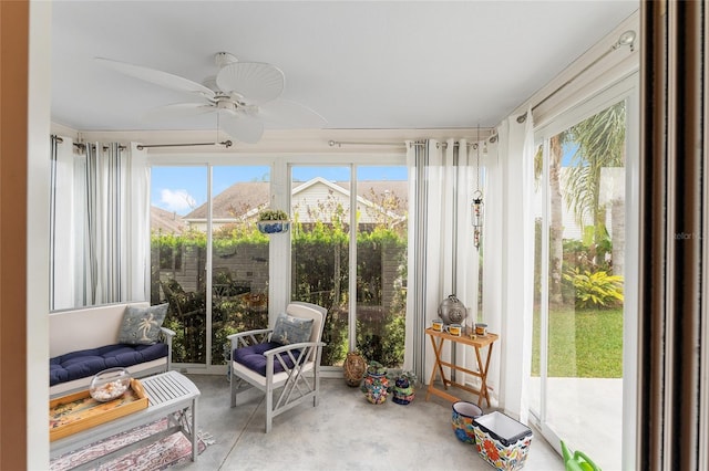 sunroom / solarium with ceiling fan