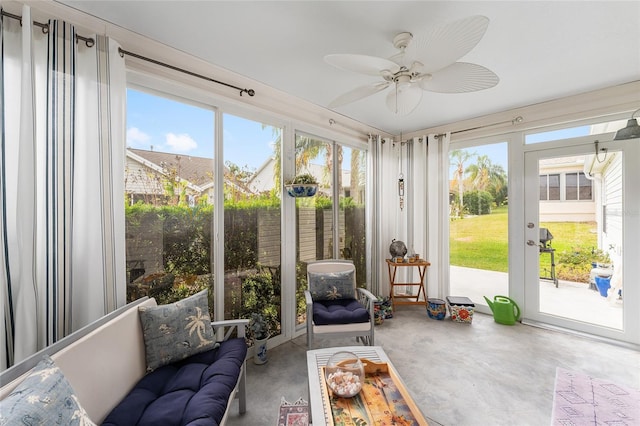 sunroom / solarium with ceiling fan