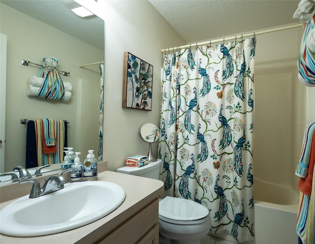 full bathroom with toilet, vanity, a textured ceiling, and shower / bath combination with curtain