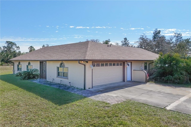 view of property exterior with a yard and a garage