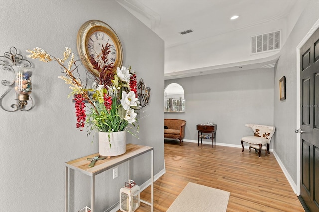 hallway featuring hardwood / wood-style flooring