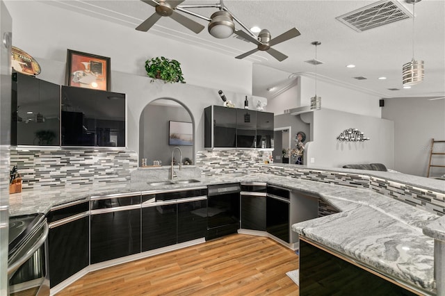 kitchen with sink, ceiling fan, electric range, black dishwasher, and decorative backsplash