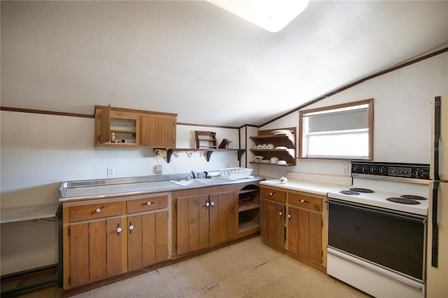 kitchen with vaulted ceiling, white range with electric cooktop, and sink