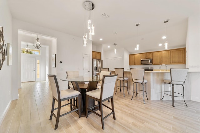 dining space featuring a chandelier