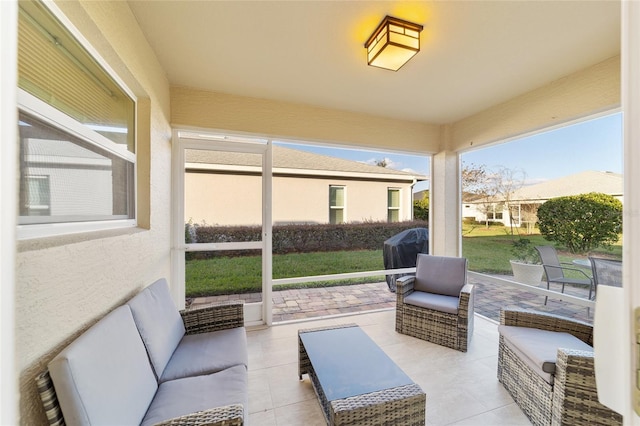 sunroom / solarium featuring a healthy amount of sunlight