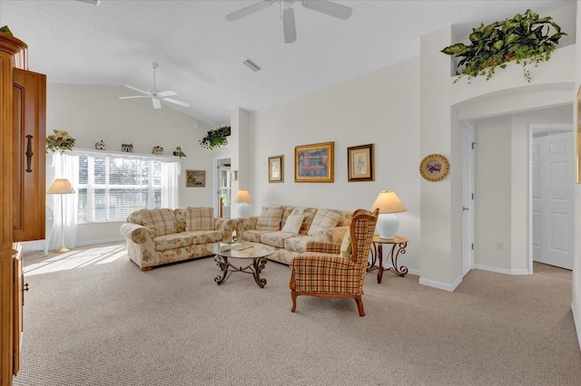 living room featuring light carpet, high vaulted ceiling, and ceiling fan