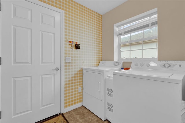 laundry area featuring separate washer and dryer