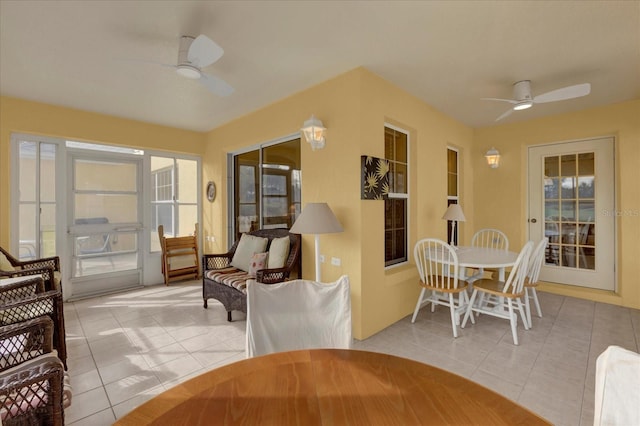 sunroom / solarium with ceiling fan