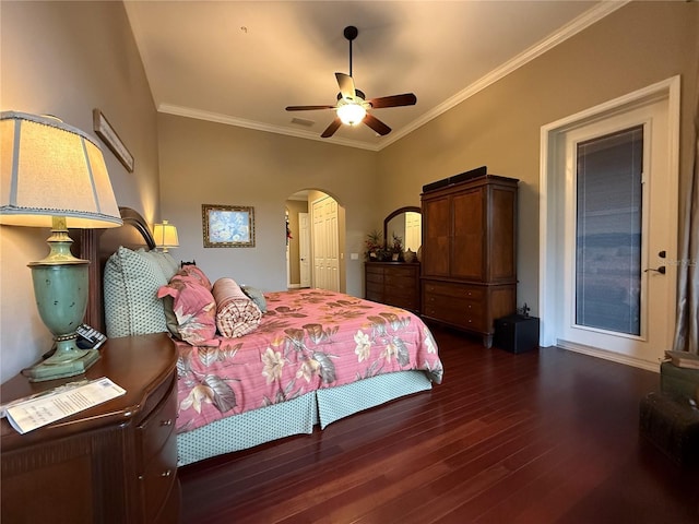 bedroom featuring ceiling fan, dark hardwood / wood-style flooring, and ornamental molding