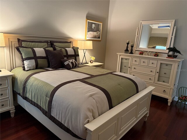 bedroom featuring dark hardwood / wood-style floors