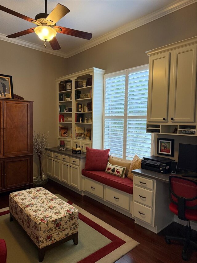 office space with ceiling fan, dark wood-type flooring, and ornamental molding