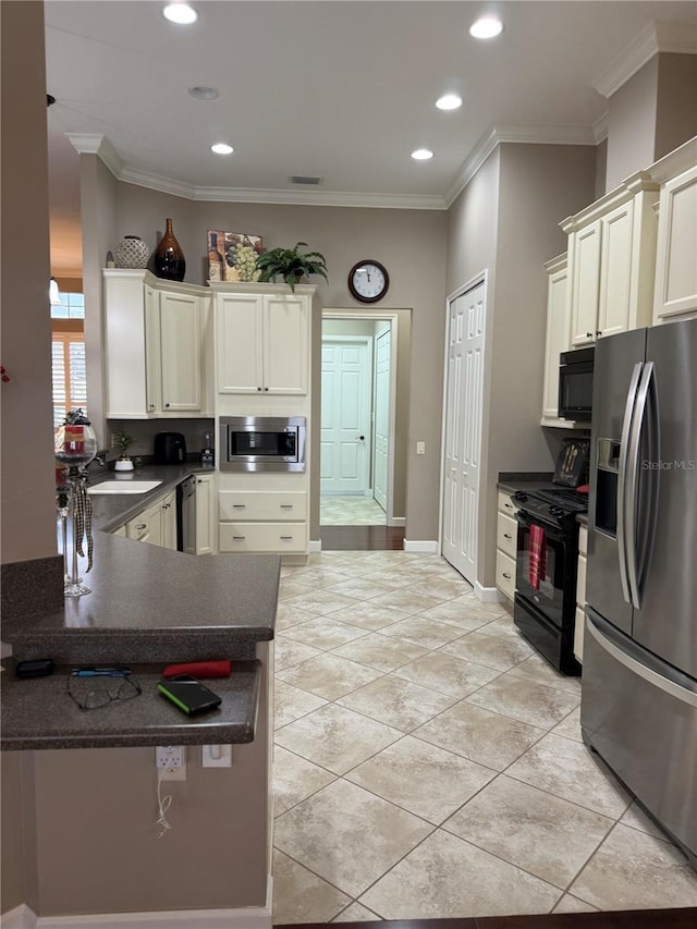 kitchen featuring black appliances, sink, ornamental molding, light tile patterned floors, and kitchen peninsula