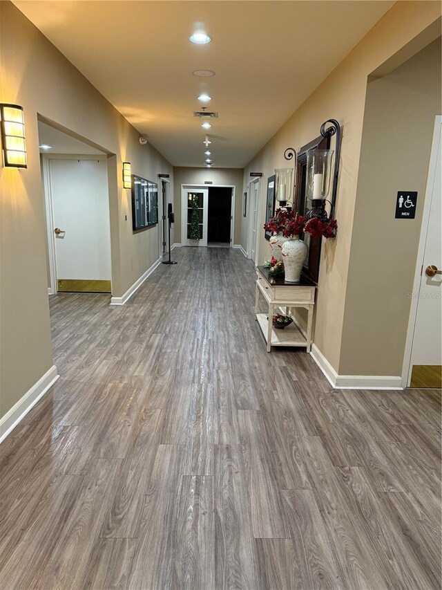 hallway featuring hardwood / wood-style floors