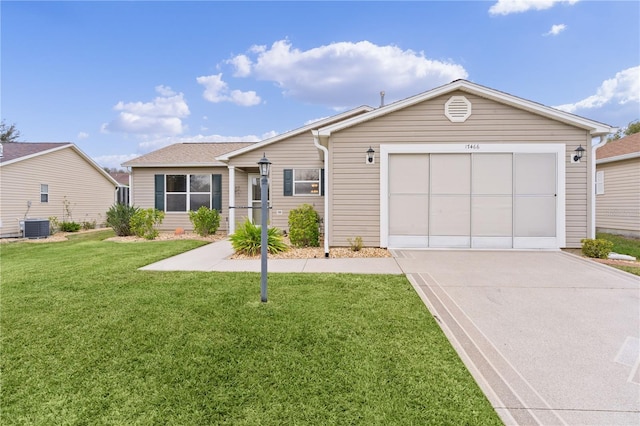 ranch-style house with a garage, central air condition unit, and a front lawn