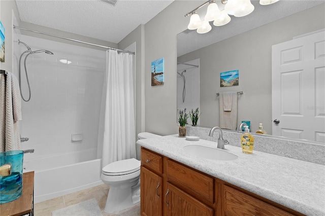 full bathroom with shower / bath combination with curtain, tile patterned floors, vanity, a textured ceiling, and toilet