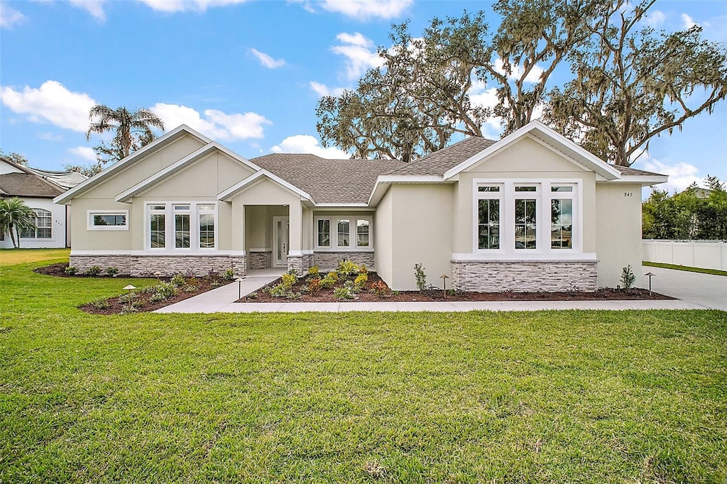 view of front of home with a front yard