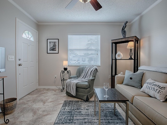 living room with ceiling fan, crown molding, and a textured ceiling