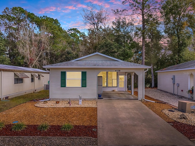 view of front of property with a carport