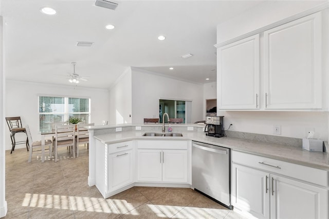 kitchen with white cabinetry, light tile patterned floors, kitchen peninsula, dishwasher, and sink