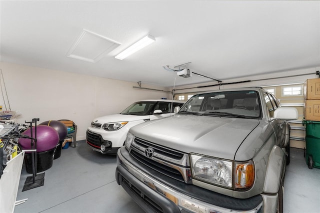 garage featuring a garage door opener