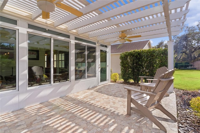 view of patio / terrace featuring a pergola and ceiling fan