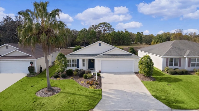 ranch-style house featuring a front yard and a garage