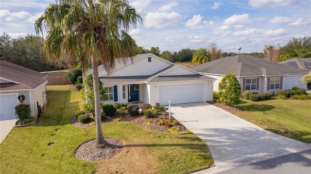 ranch-style home featuring a garage and a front yard