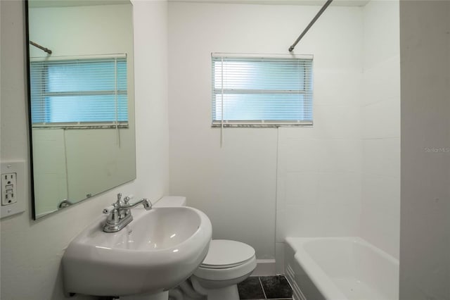 full bathroom with tile patterned floors,  shower combination, toilet, and sink