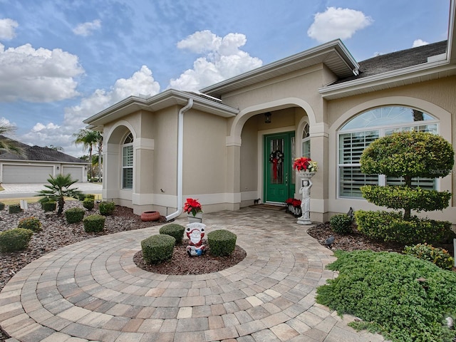 property entrance featuring a garage