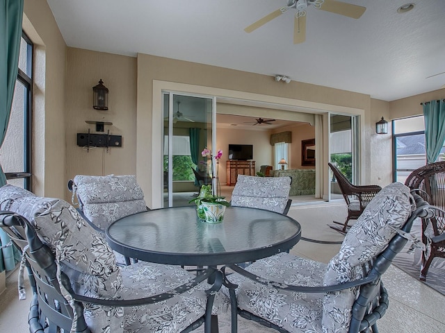 interior space featuring ceiling fan