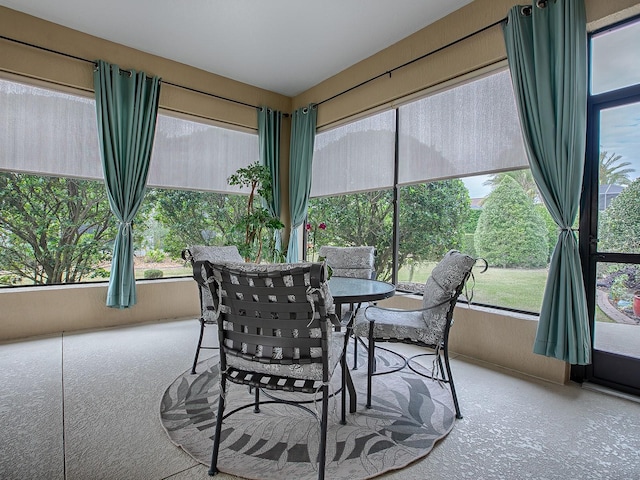 sunroom / solarium featuring a wealth of natural light