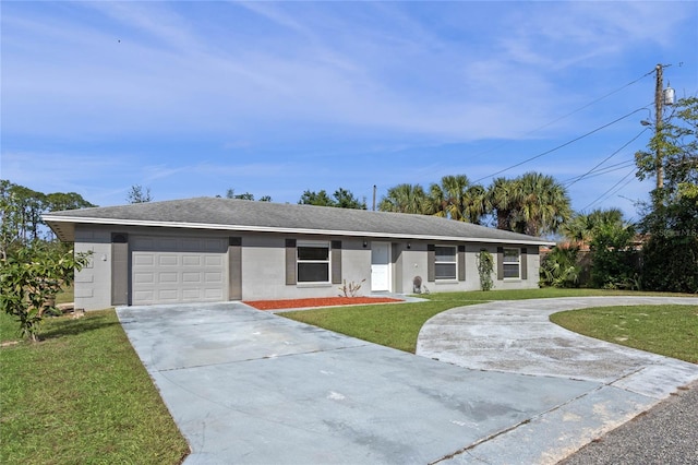 ranch-style home with a front yard and a garage