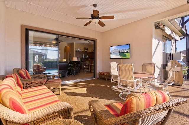 view of patio with ceiling fan