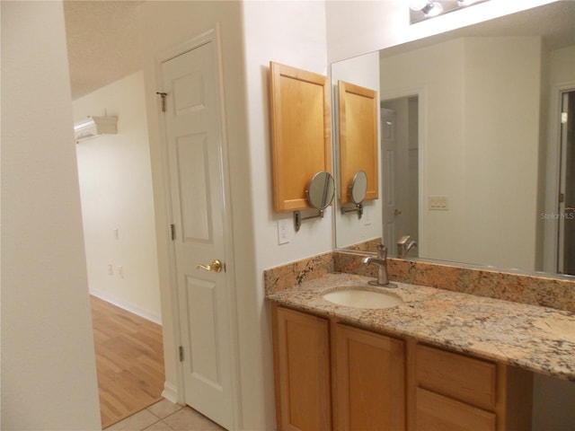 bathroom featuring vanity and tile patterned floors