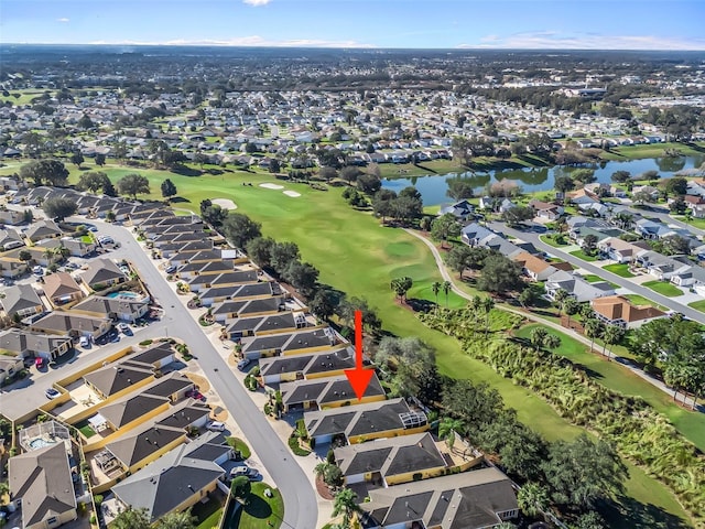 bird's eye view featuring a residential view, a water view, and golf course view