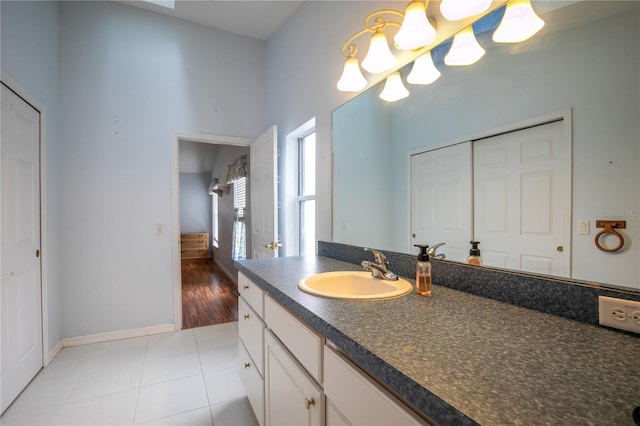 bathroom with tile patterned floors and vanity