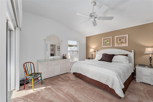 carpeted bedroom featuring ceiling fan and lofted ceiling