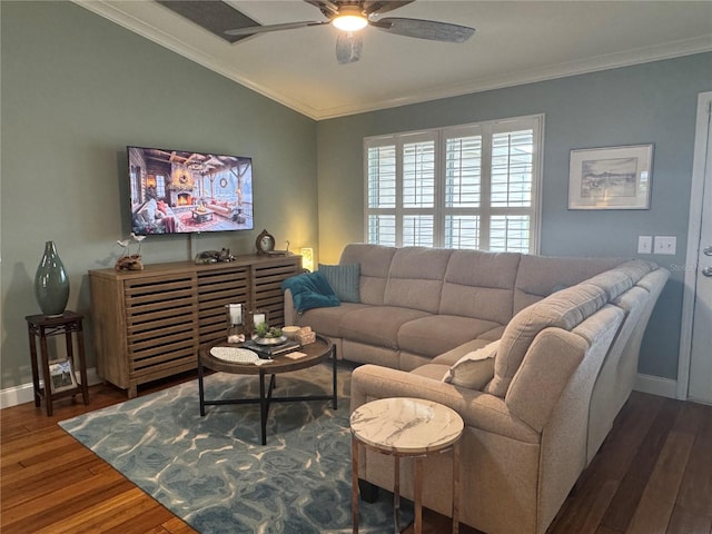 living room featuring ceiling fan, vaulted ceiling, dark hardwood / wood-style floors, and ornamental molding