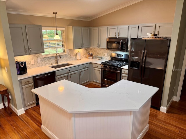 kitchen with gray cabinets, hanging light fixtures, a kitchen island, black appliances, and sink