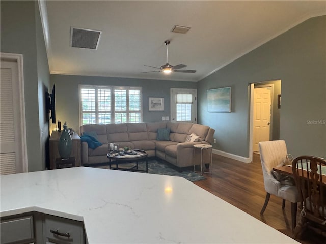 living room with ceiling fan, dark hardwood / wood-style floors, and lofted ceiling