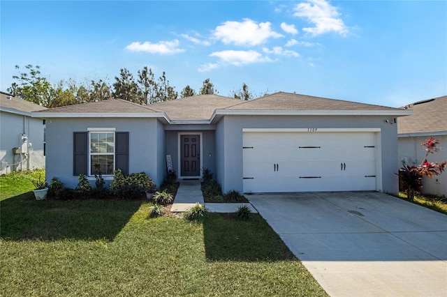 single story home with a front lawn and a garage