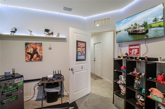 office area with light tile patterned floors