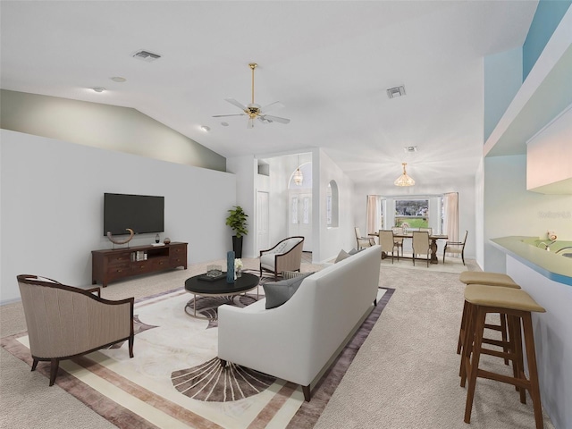 carpeted living room featuring ceiling fan with notable chandelier and lofted ceiling