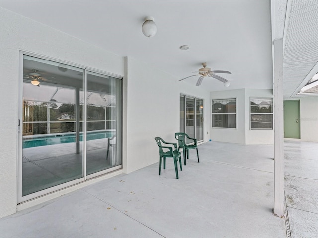 view of patio / terrace featuring ceiling fan