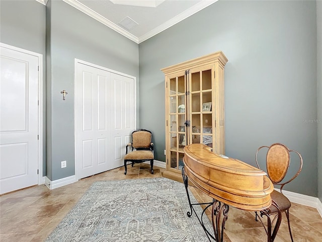 sitting room featuring ornamental molding