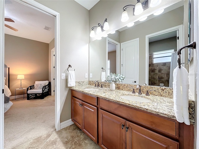 bathroom featuring vanity and ceiling fan